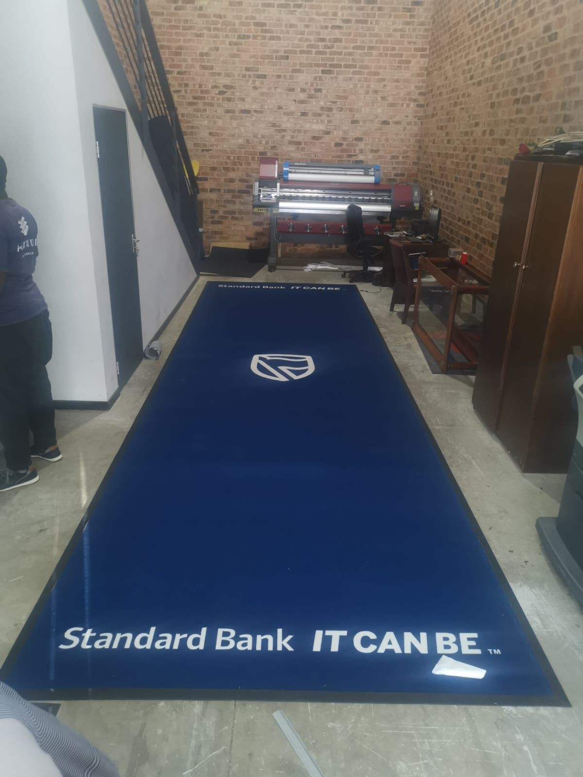Navy branded carpet runner 5000mm x 1000mm with corporate logo